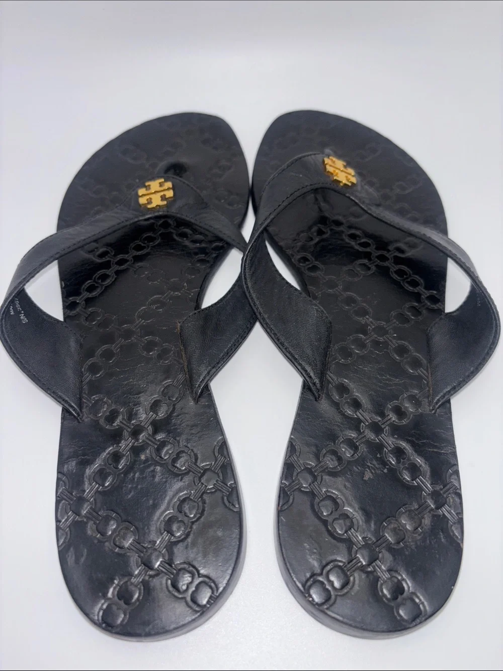 Tory Burch Black Leather Logo Thong Sandals with Gold Emblem